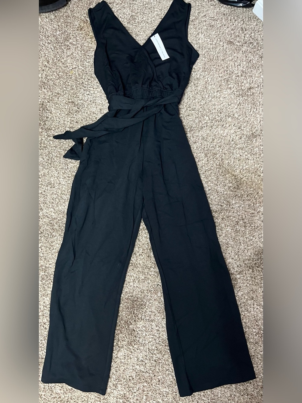 The Drop Sleeveless Black V-Neck Jumpsuit with Tie Waist - Size Medium - NWT